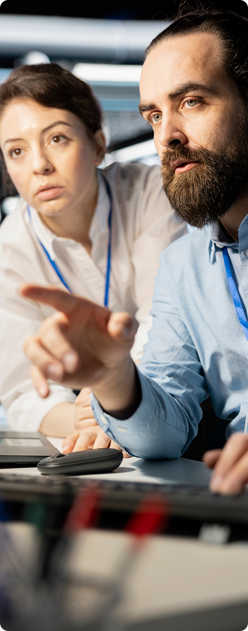 man and girl work on laptop