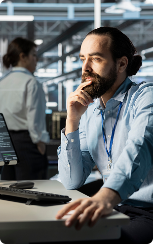 man thinking on his workplace