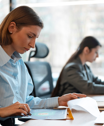 people office analyzing finance graph